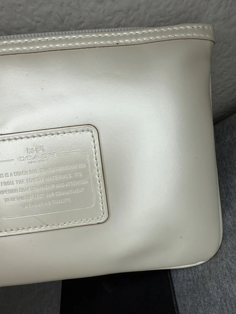 Coach Shimmering Ivory Leather Large Wristlet Clutch with Blue Glitter Charm